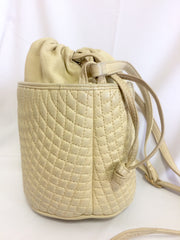 Vintage BALLY ivory white quilted lambskin mini hobo, bucket shoulder bag with golden B charm and drawstrings.