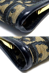 SOLD OUT: 80's Christian Dior Vintage navy monogram coin case with gold tone clip closure.