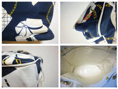 SOLD OUT: Vintage CHANEL white and navy canvas large tote with super model and 2.55 bag print and big CC charm. Chanel collector and lover.