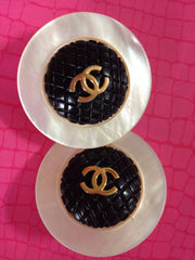 Vintage CHANEL extra large round shell earrings with black and golden CC motif. Great and rare Chanel vintage jewelry gift.