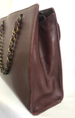 Vintage CHANEL wine chocolate brown leather shoulder bag with copper finished chains and CC closure. Classic and daily use bag.