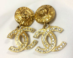 Vintage CHANEL gorgeous dangling earrings with large CC mark and button motif with rhinestone crystals. Rare, one-of-a-kind Chanel jewelry.