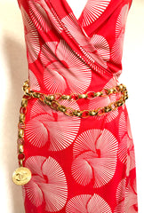 Vintage CHANEL golden chain belt with large CC motif charm. Nice and heavy, rare and Gorgeous accessory.