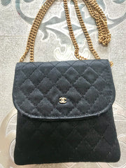 Vintage Chanel black quilted satin fabric mini pouch, coin purse, long necklace with golden chain and CC motif. Great gift Chanel jewelry