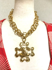 Vintage Chanel oval chain statement necklace with large flower clover shape pendant top with CC mark. Gorgeous masterpiece jewelry.