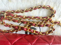 Vintage CHANEL red lamb leather shoulder bag with golden CC button motifs at flap. Rare purse.