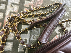 Vintage CHANEL brown quilted lamb leather classic tote bag with gold tone chains and CC charm. Classic purse.