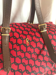 Vintage Roberta di Camerino red, green and navy duffle style purse with gold tone R logo charm. TALON zipper.