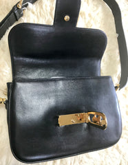 Vintage Celine black leather shoulder bag with golden logo and carriage closure. Elegant and classic purse. Must have daily use piece.