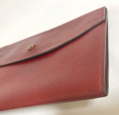 Vintage HERMES brick red leather clutch purse with gold tone logo motif. Classic and sophisticated style for unisex. Classic purse.