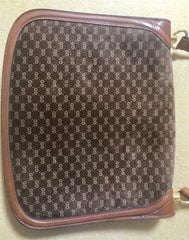 Vintage Gucci brown leather micro GG print shoulder bag with iconic golden large round GG motif. Rare masterpiece purse.