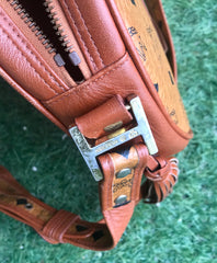 Vintage MCM brown monogram round Suzy Wong shoulder bag with brown leather trimmings. Designed by Michael Cromer. Made in Germany.