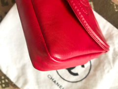 Vintage CHANEL red leather belt bag, fanny pack with detachable chain belt and CC stitch mark on flap. Fits 29.5" through 32.8"