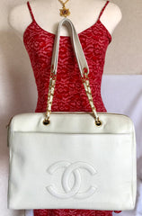 Vintage CHANEL white color caviar leather chain shoulder large tote bag with gold-tone chain handles and large CC stitch mark.