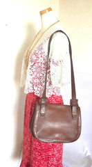 Vintage Valentino Garavani brown nappa leather shoulder bag with V logo motifs at front. Unisex and daily use.
