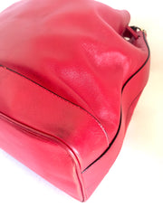 Vintage Celine red leather hobo bucket shoulder bag with a golden square logo motif and matching pouch. Classic drawstrings purse.