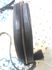 Vintage MCM black monogram round shape Suzy Wong shoulder bag with leather trimmings and fringes. Unisex. West Germany made.