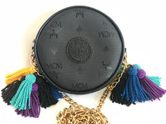 Vintage MCM black monogram mini Suzy Wong pouch bag with golden chain and multicolor fringes, designed by Michael Cromer. Made in Germany.