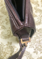 80's vintage Chanel dark brown quilted lambskin shoulder bag with CC motif and built-in chain shoulder strap. Rare Chanel purse