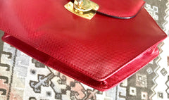 Vintage Bottega Veneta grained red leather hexagon shape handbag with golden hardware. Rare purse.