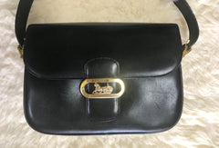 Vintage Celine black leather shoulder bag with golden logo and carriage closure. Elegant and classic purse. Must have daily use piece.