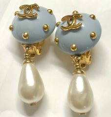 Vintage CHANEL white teardrop faux pearl dangle earrings with blue and golden CC mark and studs on top. Must have jewelry.