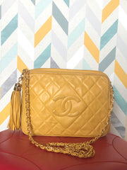 Vintage Chanel yellow lambskin camera bag style chain shoulder bag with fringe and CC stitch mark. Good daily purse. Good fortune color.
