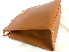 Vintage CHANEL camel brown caviar leather square shoulder bag with golden CC motif. Classic bag.