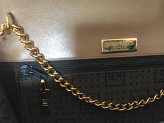 NEW with tag, MINT. Vintage Nina Ricci beige leather clutch shoulder bag with a large bow stitch and golden chain. Perfect party purse.