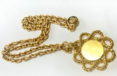 Vintage Sonia Rykiel long golden chain necklace with twisted flower and logo pendant top. Perfect vintage jewelry from SR.