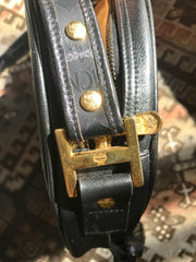 Vintage MCM black monogram round shape Suzy Wong shoulder bag with leather trimmings and fringes. Unisex bag