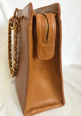 Vintage CHANEL camel brown caviar leather square shoulder bag with golden CC motif. Classic bag.