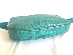 Vintage Fendi blue oval round shape shoulder purse with small FF logo print allover. So chic and cute.