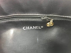 Vintage CHANEL black lambskin large tote bag with gold tone chains and jumbo CC charm to the LAMPO zipper. Classic purse