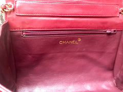 Vintage CHANEL red lamb leather shoulder bag with golden CC button motifs at flap. Rare purse.