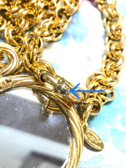 Vintage CHANEL long chain necklace with round mirror amd twisted CC pendant top. Can be worn in double. Gorgeous masterpiece.