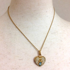 Vintage LANVIN golden skinny chain necklace with heart logo charm pendant top with clear crystals and blue crystal. Perfect jewelry gift.