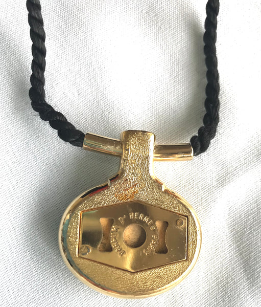 Vintage Hermes golden and red stone charm pendant top necklace