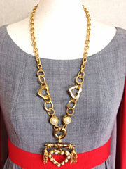 MINT. Vintage Moschino thick chain statement necklace with large heart charm with faux pearls and chain fringe. Jewelry By Moschino BIJOUX