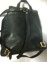 80's vintage MCM genuine leather black backpack with golden studded logo motifs. Designed by Michael Cromer. Unisex bag for daily use.