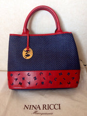 Vintage Nina Ricci navy woven straw and red leather mix handbag, tote bag with golden logo charm. Mod and chic daily purse.