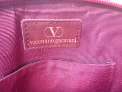 Vintage Valentino Garavani wine burgundy leather clutch, mini shoulder bag with V stitches and golden motif. Classic purse