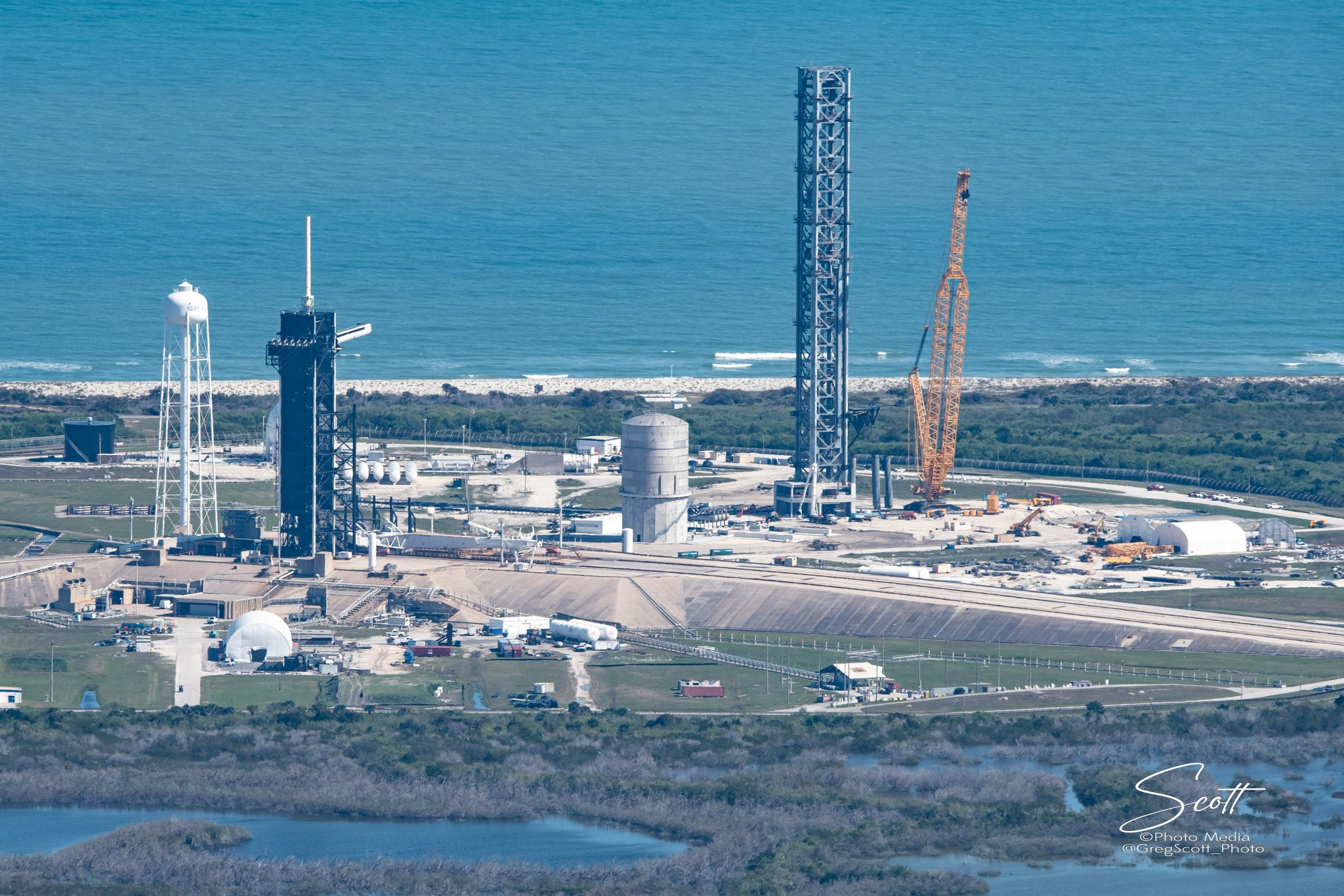 SpaceX installs robotic arms to the Starship launch tower at the NASA Kennedy Space Center in