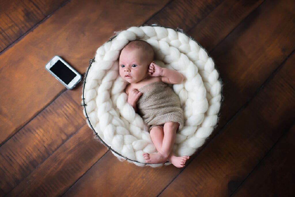 newborn photography examples newborn in basket prop