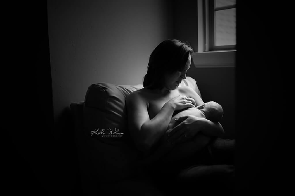 newborn photography examples mother nursing a newborn 