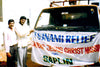 Rev. Benjamin's ministry handing out food and supplies after the devastating tsunami in 2005