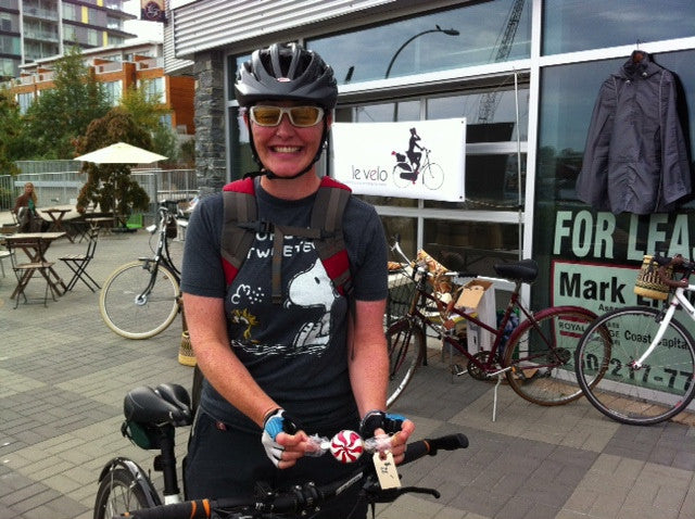 Nicole with her hand-painted bicycle bell from Le Vélo Victoria