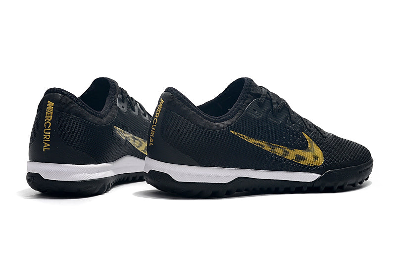 chuteira da nike preta com dourado