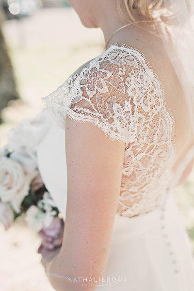 French lace detail on a Peony Rice wedding gown