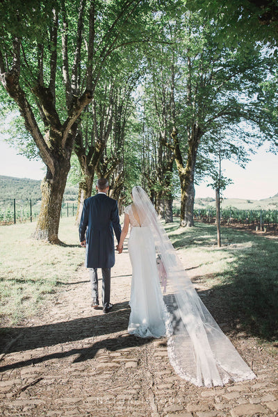 Peony Rice Bride wearing a handmade french lace veil